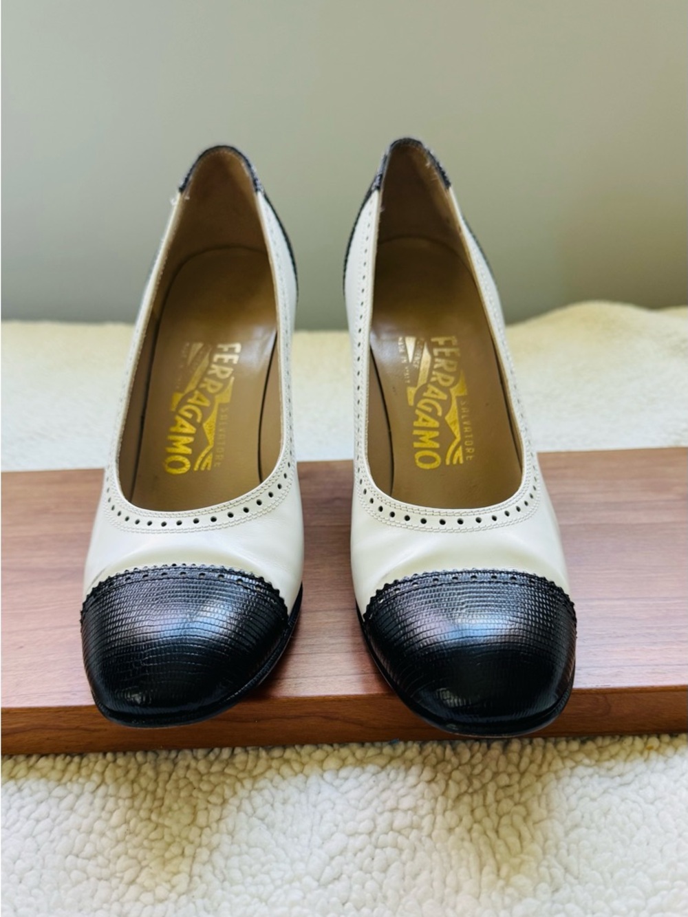 Salvatore Ferragamo Two-Tone White Leather Pumps with Black Textured Cap Toe